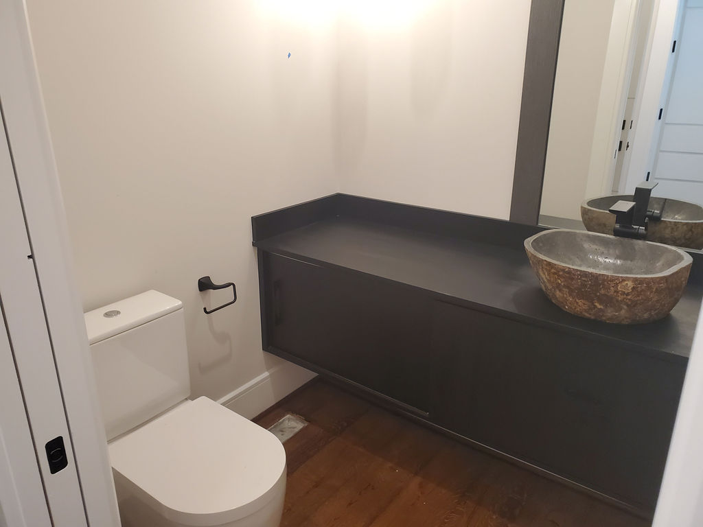 B68-Bathroom-with-vessel-sink-and-floating-cabinet
