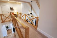R65-wood-and-wire-railings-on-cat-walk-shows-exposed-beams